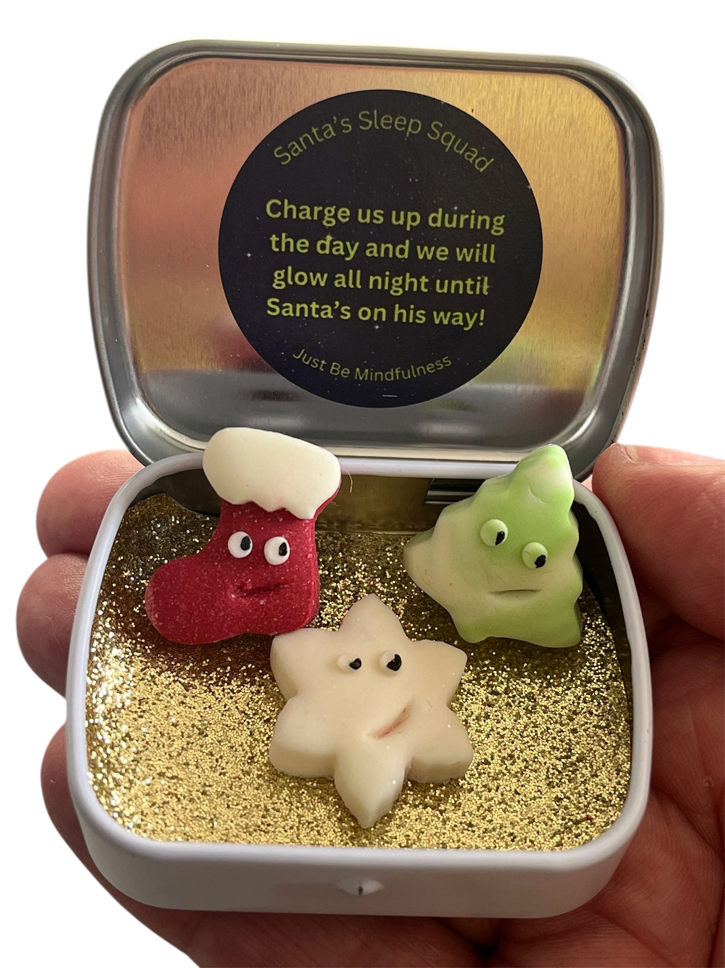 Santa's Sleep Squad - Little tin that glows in the dark.